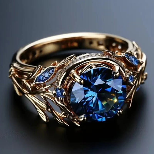 Eleganter ovaler blauer Synthetik-Zirkonia-Ring für Damen, goldfarbener Kupferakzent – Luxuriöser synthetischer Kubik-Zirkonia, April-Geburtsstein, KC, geeignet für Hochzeiten, Partys, Alltag  besondere Anlässe – Langlebiges Verlobungs-/Jubiläumsgeschenk