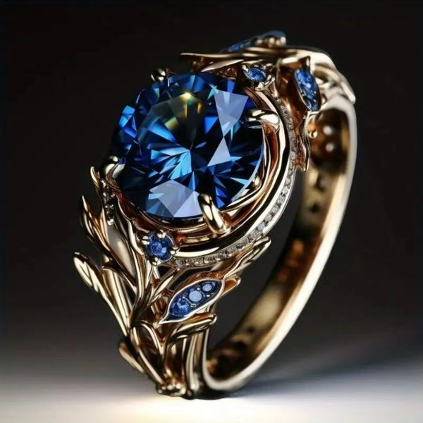 Eleganter ovaler blauer Synthetik-Zirkonia-Ring für Damen, goldfarbener Kupferakzent – Luxuriöser synthetischer Kubik-Zirkonia, April-Geburtsstein, KC, geeignet für Hochzeiten, Partys, Alltag  besondere Anlässe – Langlebiges Verlobungs-/Jubiläumsgeschenk